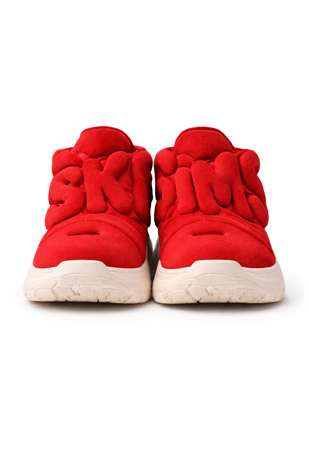 Supplied front view of red SKIMS sculptural lettering uppers above a white sole